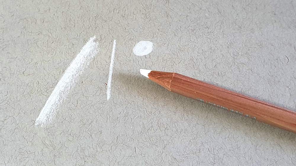white caran d'ache luminance colored pencil highlights drawn on grey toned paper