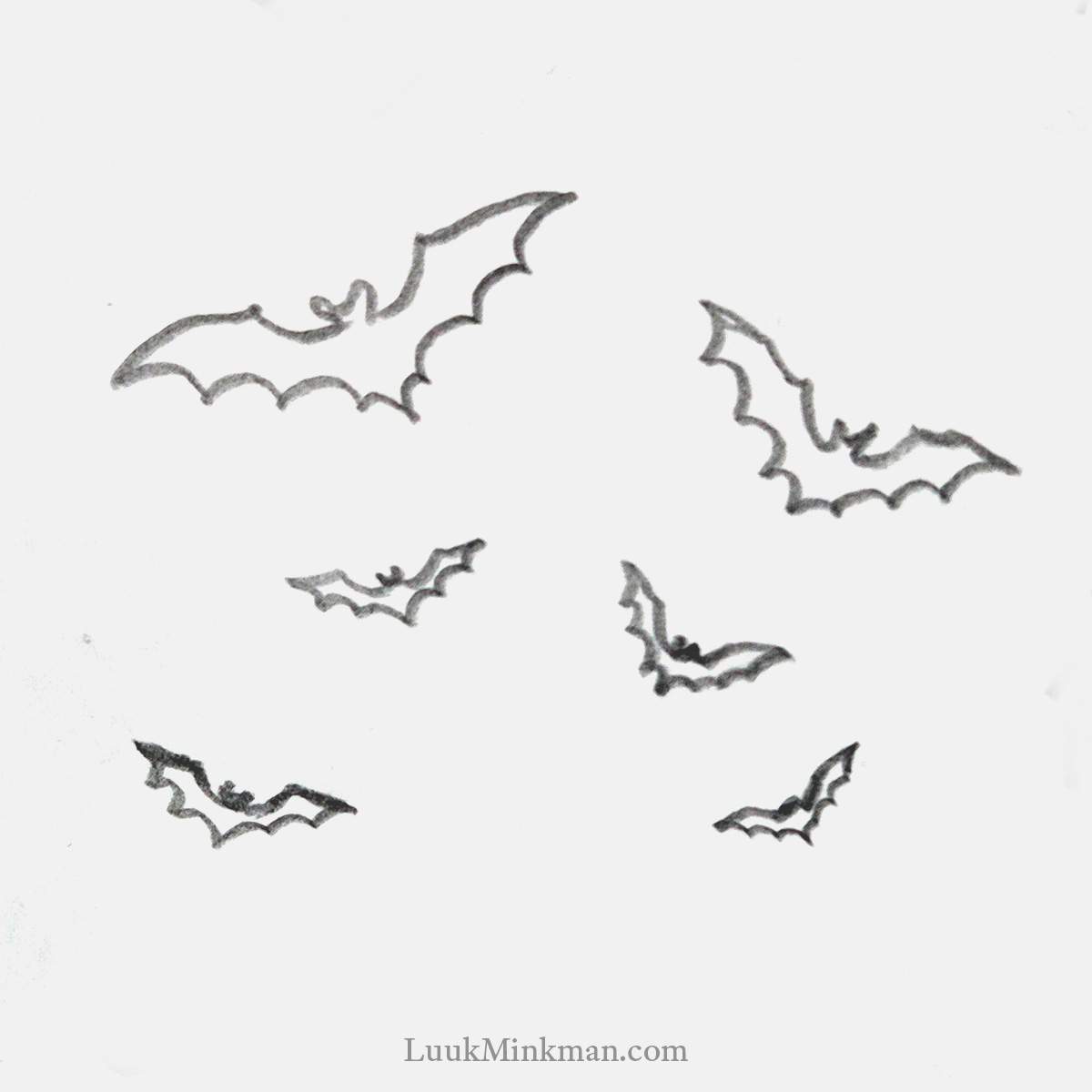 simple pencil drawing of several flying bats