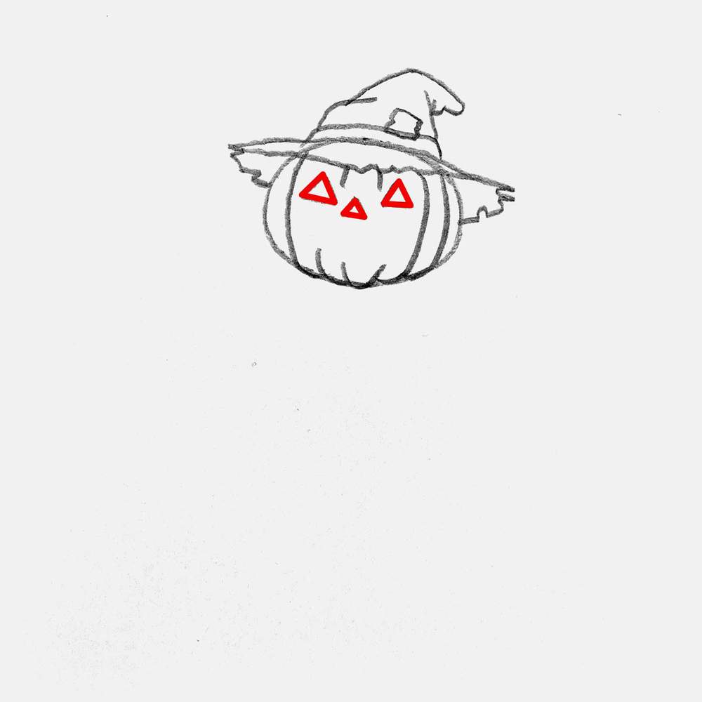 Add the triangle-shaped eyes and nose.