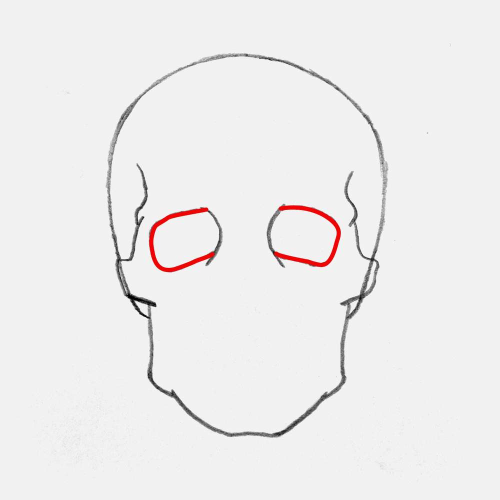 Somplete the eye sockets by adding a rounded rectangle shape connecting to the curved lines.