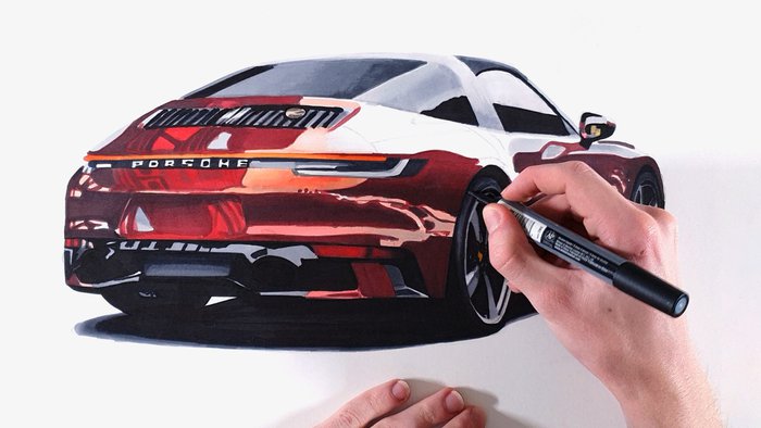 Photo of a person drawing a porsche 992 targa 4 with alcohol markers