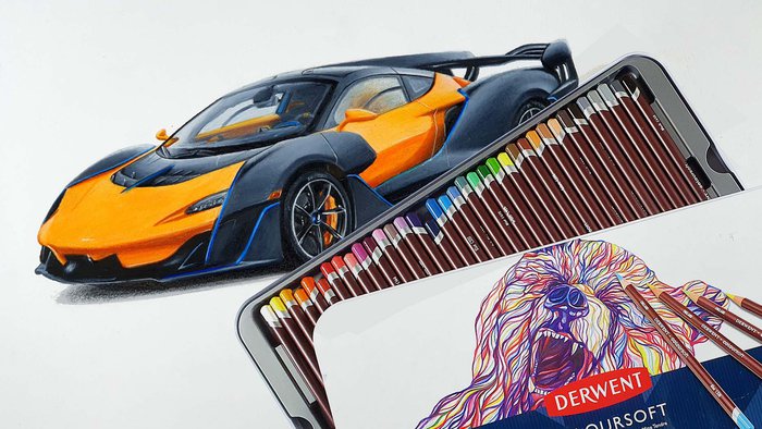 a drawing of an orange mclaren sabre half covered with a box of derwent coloursoft colore dpencils