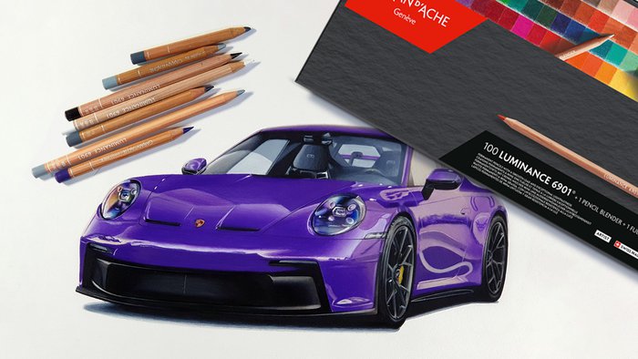 drawing of a purple porsche 992 gt3 next to a box of caran d'ache luminance colored pencils